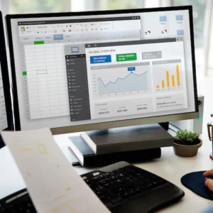 businessman-working-graph-spreadsheet-white-table_53876-38480